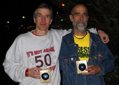Two "over 50" runners celebrating their award-winning races.