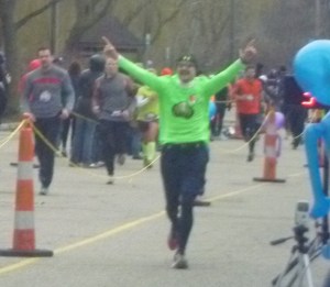 Yeah, baby! Marathoner at the finish line.