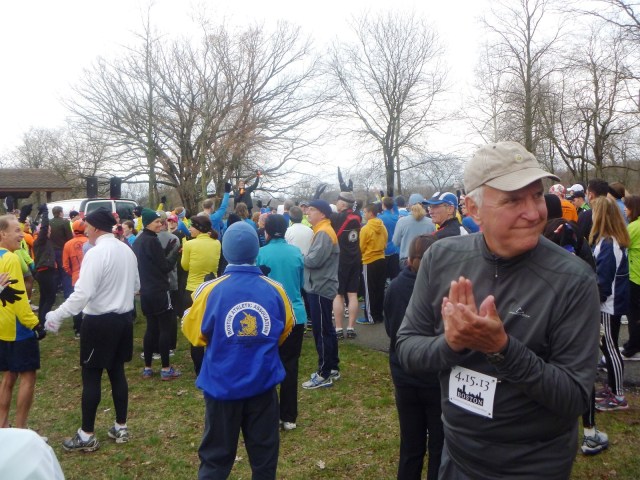 Randy Step (center, orange gloves) fires up the unity run crowd.