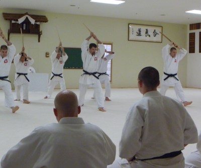 Our new Vermont dojo sensei (center) at a black belt test demonstration.