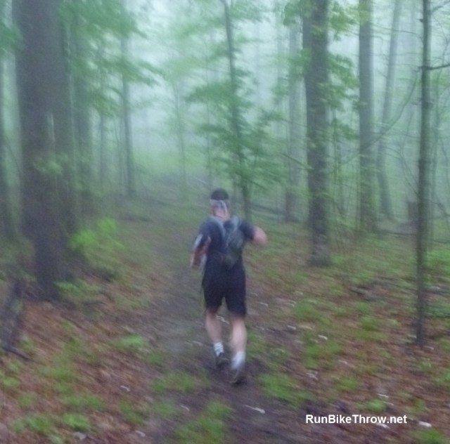 Slogging up a long climb. Well, could be worse - like it could start - raining - oh, nuts.