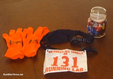 "No frills" race swag: gloves, chipless bib, and age group award.