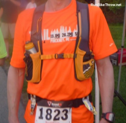 My backpack has pockets for two bottles. I just need to use them both. The camera can go elsewhere.