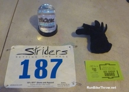 Swag: Finisher's snow globe and age group gloves + gift certificate.